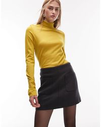 ARKET - Mini-jupe en laine majoritaire avec poches sur le devant - foncé - Lyst