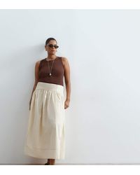 ARRANGE - Curve Drop Waist Maxi Skirt With Topstitching Detail - Lyst