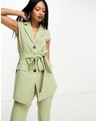In The Style - Americana verde sin mangas con lazada en la cintura de - Lyst