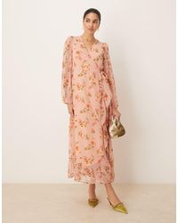 Vila - Vestido Largo Rosa Cruzado Con Estampado Floral Y Detalle De Volantes De Plumeti De - Lyst