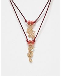 ASOS - Collier multi-rangs avec cordon et charms marins - doré - Lyst