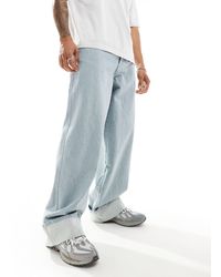Collusion - X015 - jeans super larghi a vita bassa lavaggio blu chiaro con risvolto - Lyst