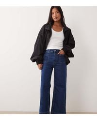 ASOS - Asos Design Petite High Waist Wide Leg Jeans With Front Pockets - Lyst