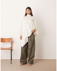 ARRANGE - High Neck Drape Cape Top - Lyst