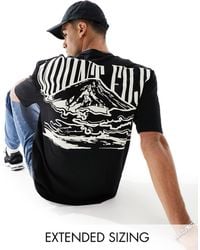ASOS - T-shirt oversize nera con stampa di montagne sulla schiena - Lyst