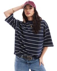 Vero Moda - Camiseta Azul Marino A Rayas Con Cuello Alto Y Sisas Caídas De - Lyst