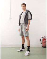 Umbro - Pantalones Cortos Plateados De Football - Lyst