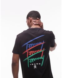 Tommy Hilfiger - Camiseta Negra Con Estampado Trasero Repetido Efecto Grafiti De - Lyst