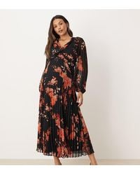 ASOS - Vestido Midi Negro Plisado Con Estampado Floral Y Diseño Cruzado De Asos Design Maternity - Lyst