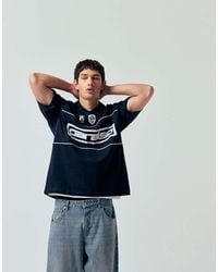 ASOS - Oversized Polo T-shirt With Panels And Paraiso Graphic - Lyst