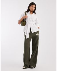 Nike - Varsity Joggingbroek Met Wijde Pijpen - Lyst