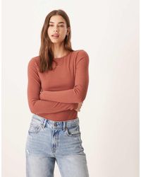 agon® - Open-Back Bodysuit - Lyst