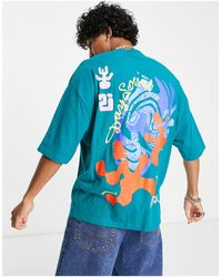 T-shirt unisexe oversize avec imprimé Dancing Spirit au dos Asos Vêtements Tops & T-shirts Tops Débardeurs Lilas 