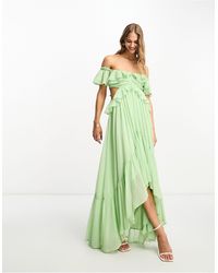 ASOS - Vestito lungo salvia a spalle scoperte con cut-out, volant e fondo asimmetrico - Lyst