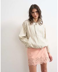 TOPSHOP - Lace Hem Wrap Mini Skirt - Lyst