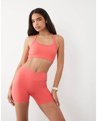 4505 - Seamless Baby Rib Wrap Waist 3"" Booty Short - Lyst
