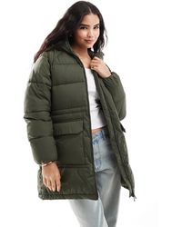 Tommy Hilfiger - – lange, übergroße pufferjacke - Lyst