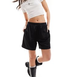 Weekday - Ada - pantaloncini sportivi neri con vita elasticizzata - Lyst
