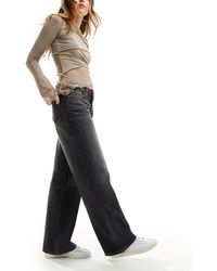 Weekday - Ample - jeans dritti ampi a vita bassa polvere - Lyst