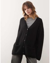 Monki - Oversized Pluizig Gebreid Vest Van Wolmix - Lyst