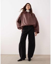 ARRANGE - Oversized Leather Bomber Coat With Balloon Sleeve - Lyst