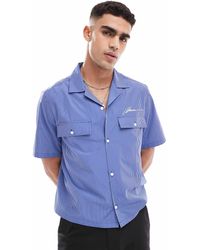ASOS - Chemise carrée décontractée à rayures avec col à revers et broderie sur la poitrine - Lyst