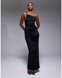 Aria Cove - Dubbel Gevormde Maxi Jurk Van Gladde Stof Met Asymmetrische Open Achterkant En Gedrapeerde Voorkant - Lyst