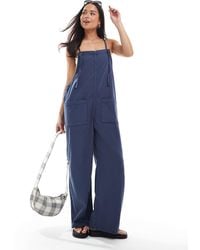 Monki - Lightweight Denim Dungarees - Lyst