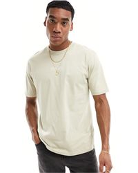 Marshall Artist - T-shirt beige a maniche corte con brand - Lyst