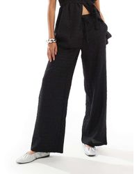 Vero Moda - Pantaloni Comodi Testurizzati Neri - Lyst