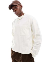 ASOS - T-Shirt Oversize Color Crema Squadrata A Maniche Lunghe Con Tasca Frontale - Lyst