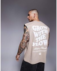 ASOS - Camiseta Beis Sin Mangas Extragrande Con Estampado Gráfico De Texto De -Neutro - Lyst