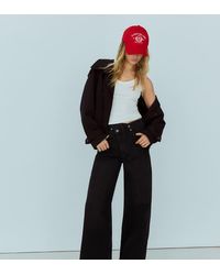 Bershka - Petite Wide-Leg Cross-Waist Jeans - Lyst