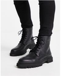 Schuh - Botas negras con suela gruesa y cordones - Lyst