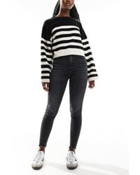 Stradivarius - Jean skinny à taille très haute - délavé - Lyst