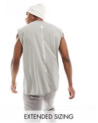 ASOS - Camiseta gris extragrande sin mangas con estampado del logo en el centro - Lyst