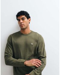 Calvin Klein - Sudadera De Cuello Redondo Y Manga Larga Con Monograma Terry En-Verde - Lyst