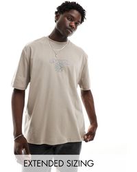 ASOS - T-shirt oversize avec imprimé céleste sur la poitrine - marron - Lyst