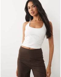 4505 - Soft Touch Scoop Neck Vest With Inner Bra And Adjustable Straps - Lyst