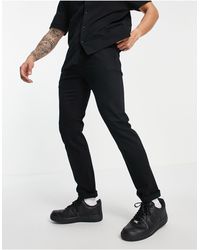 TOPMAN - Jeans slim elasticizzati neri - Lyst