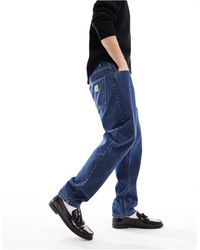 Carhartt - – newel – schmal zulaufende jeans mit lockerem schnitt - Lyst
