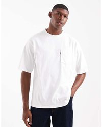 Levi's - T-Shirt Bianca Con Tasca Sul Petto Con Linguetta - Lyst