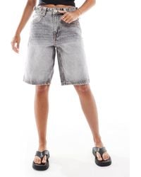 Bershka - – weite longline-shorts - Lyst