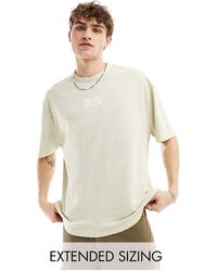 ASOS - T-shirt oversize pesante beige slavato con stampa stile souvenir sul petto - Lyst