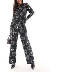Jdy - Pantalones Negros De Pernera Ancha Con Estampado Floral De (Parte De Un Conjunto) - Lyst