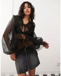 Monki - Mini-jupe en jean ornementée avec taille basse et fermeture éclair à l'avant - Lyst