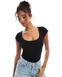 Miss Selfridge - Button Detail Short Sleeve Rib Bodysuit - Lyst