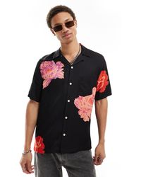 AllSaints - Roze - camicia a maniche corte nera a fiori - Lyst