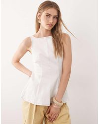 ASOS - Denim Peplum Top With Bow Back Detail - Lyst