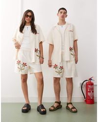 Reclaimed Vintage - Unisex Shorts With Logo And Flower Print - Lyst